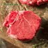 Raw beef on brown paper with 'Plainview Beef Co.' branding