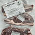 Three packages of Plainview Beef Co. beef rib steaks on a white background.