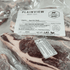 Packaged beef rib steak with Plainview Beef Co. label on a clear plastic wrap.